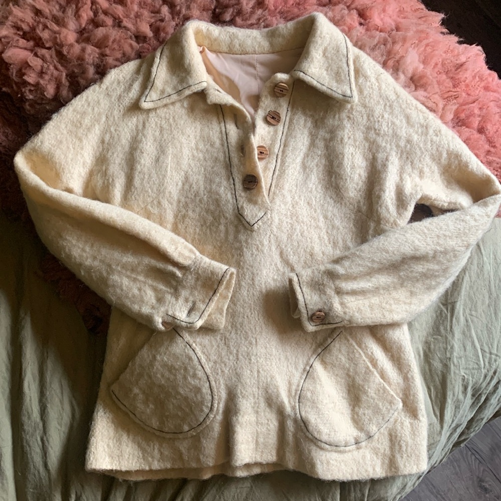 Vintage cream wool hand stitched pull over.
